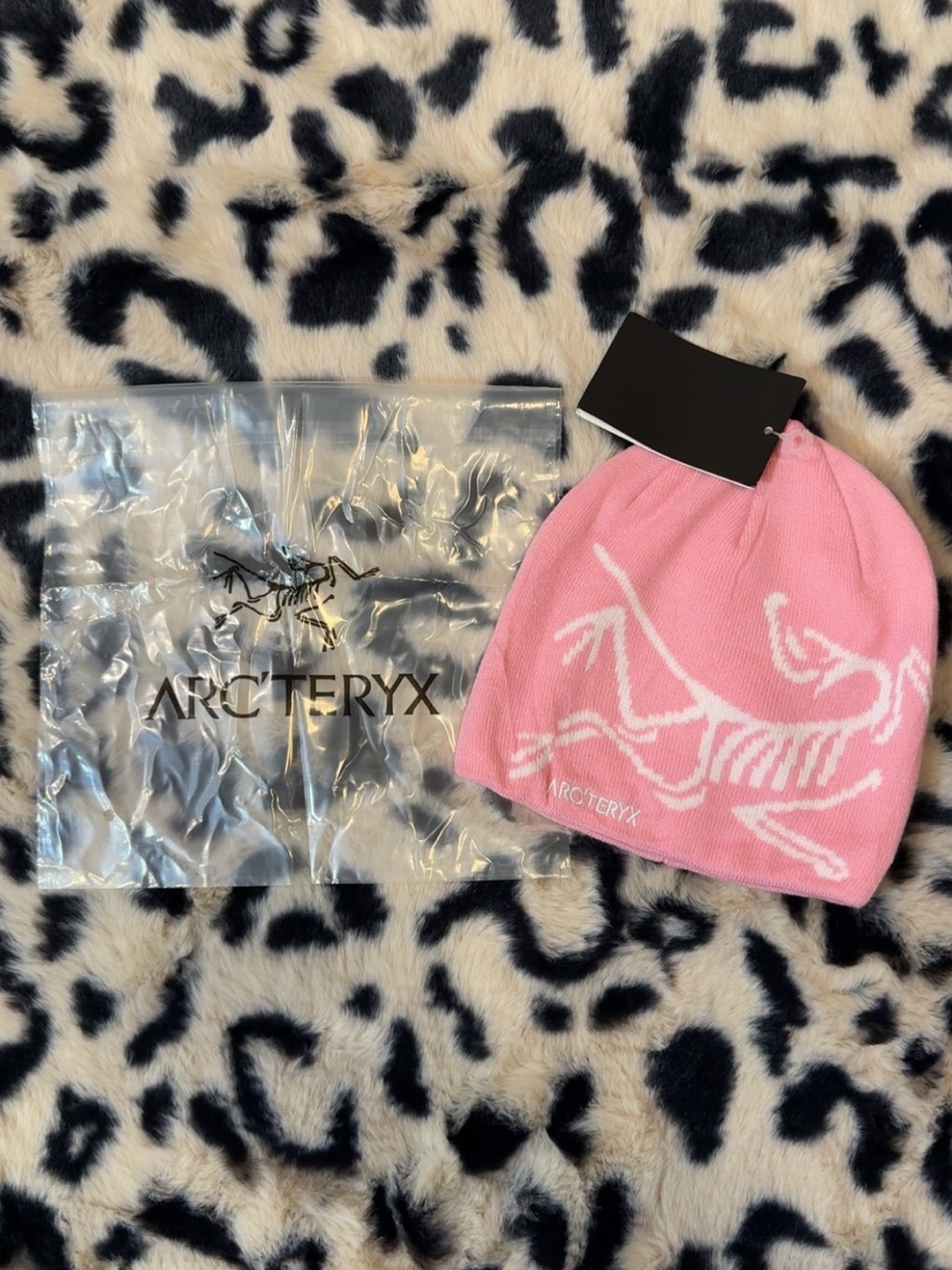 Arc'teryx Pink Beanie with White Skeleton Logo